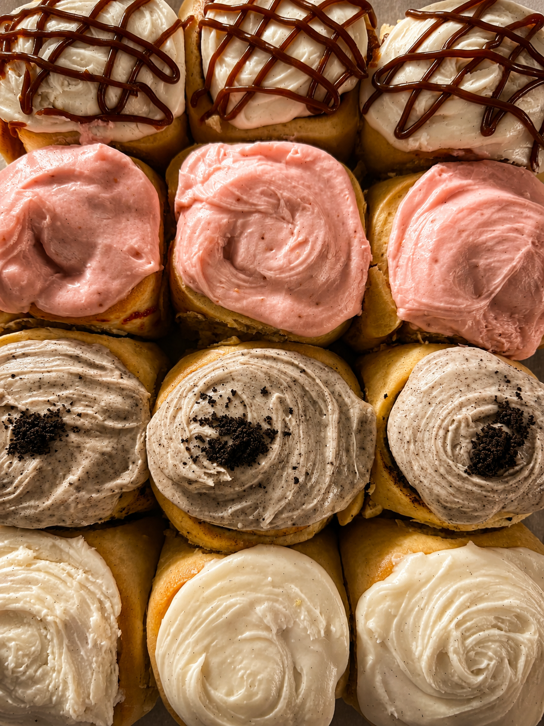 Tray of freshly frosted cinnamon rolls at the Roll Model market stand